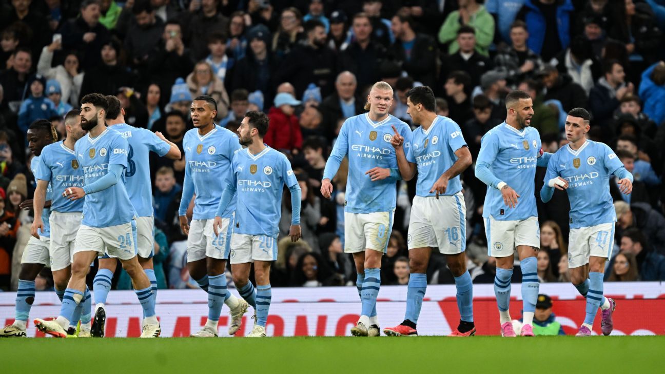 Man City sets FA Cup record with win.