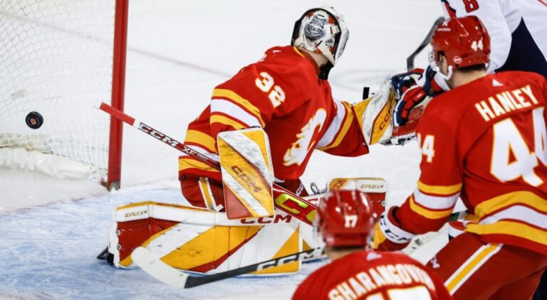 Dustin Wolf faces off against Alex Ovechkin