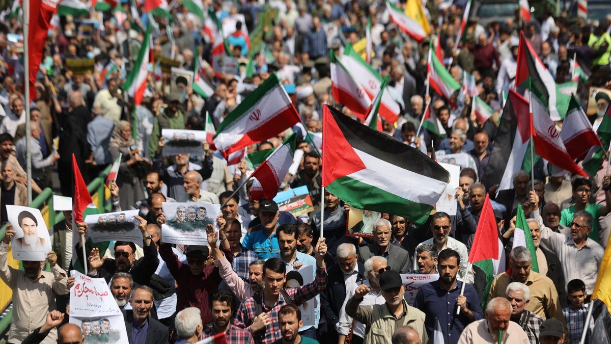 Iranians rally for Palestine; Israeli military attacks Iran