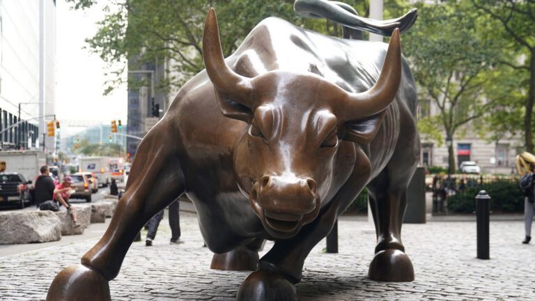 Stocks surge on strong jobs report; Dow up 318 points