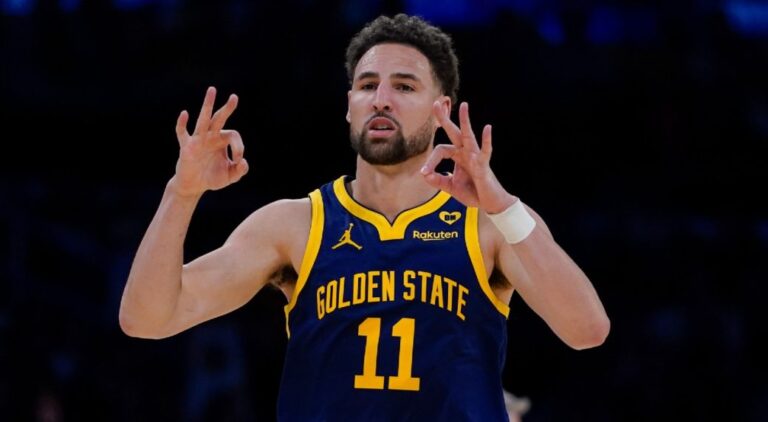 Warriors beat Lakers behind sharpshooting trio.