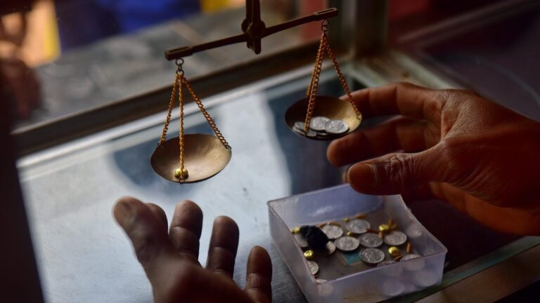 Gold near record high as inflation fears drive up prices