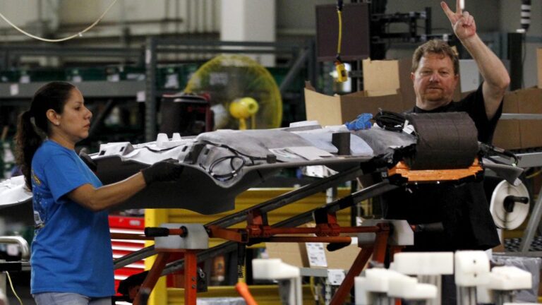 Stocks rally on strong job data; Krispy Kreme soars