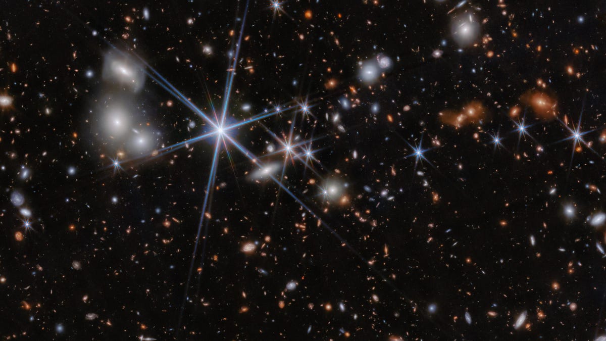 Webb Telescope Spots Distant Black Hole Merger
